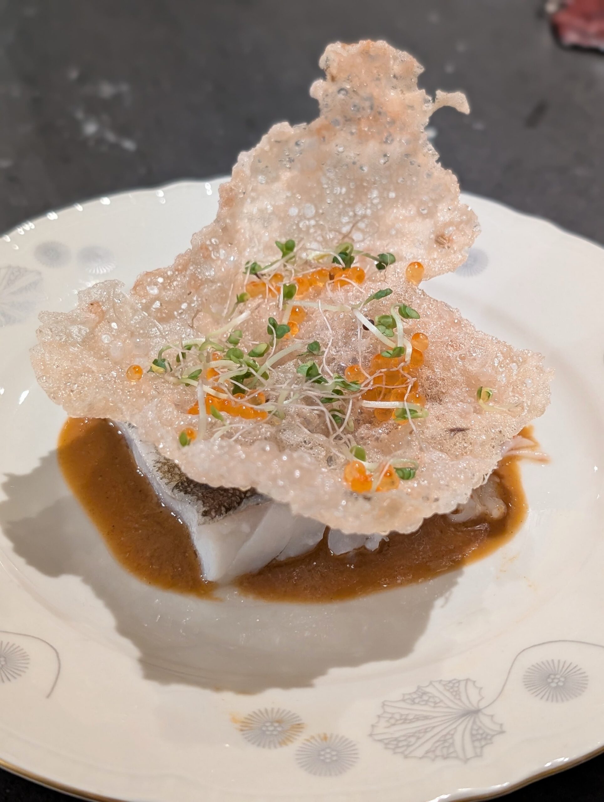 skrei garen in olie op de kamado